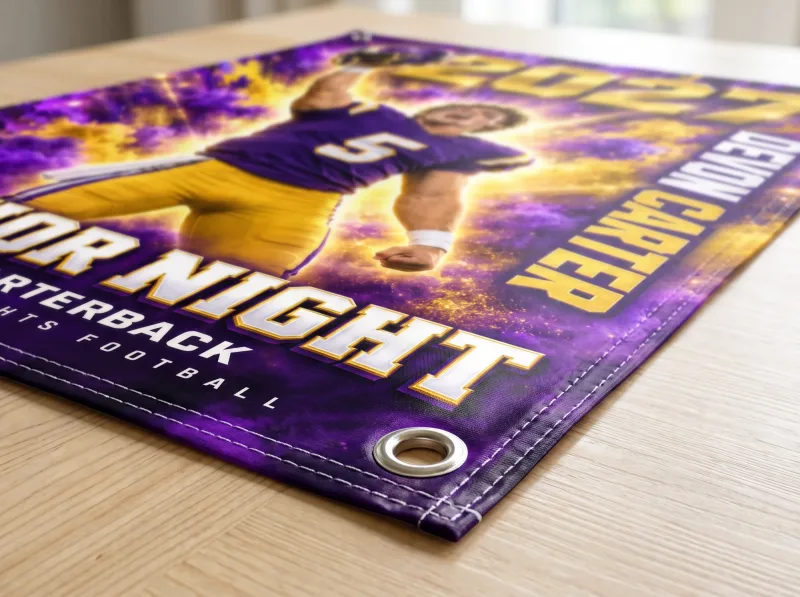 Color Burst custom senior night banner hemmed edge and metal grommet close-up