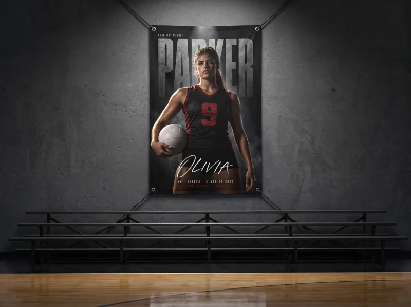 Dark Cinematic custom senior night banner hung on a gym wall