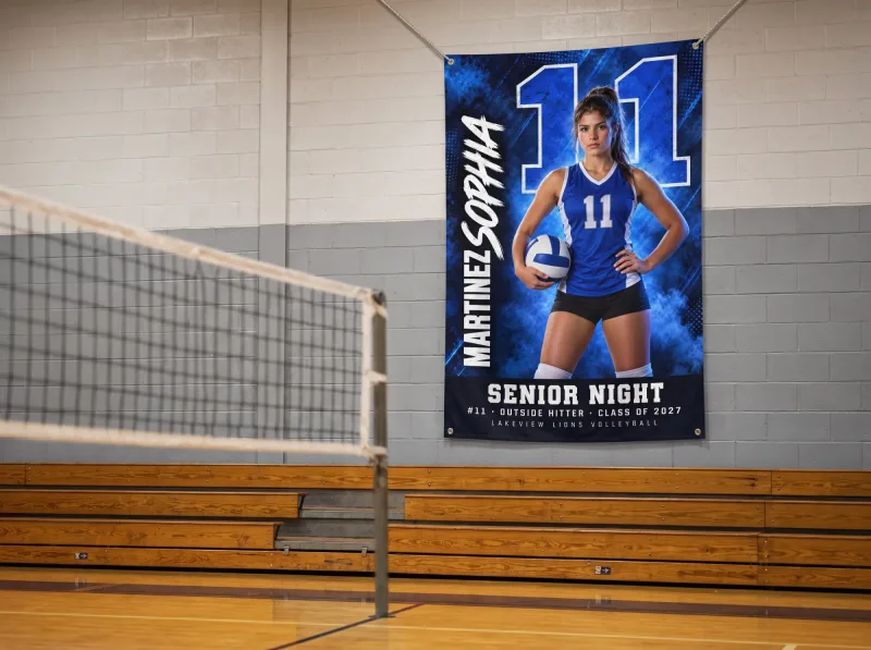 Media Day Hero custom senior night banner hung on a gym wall